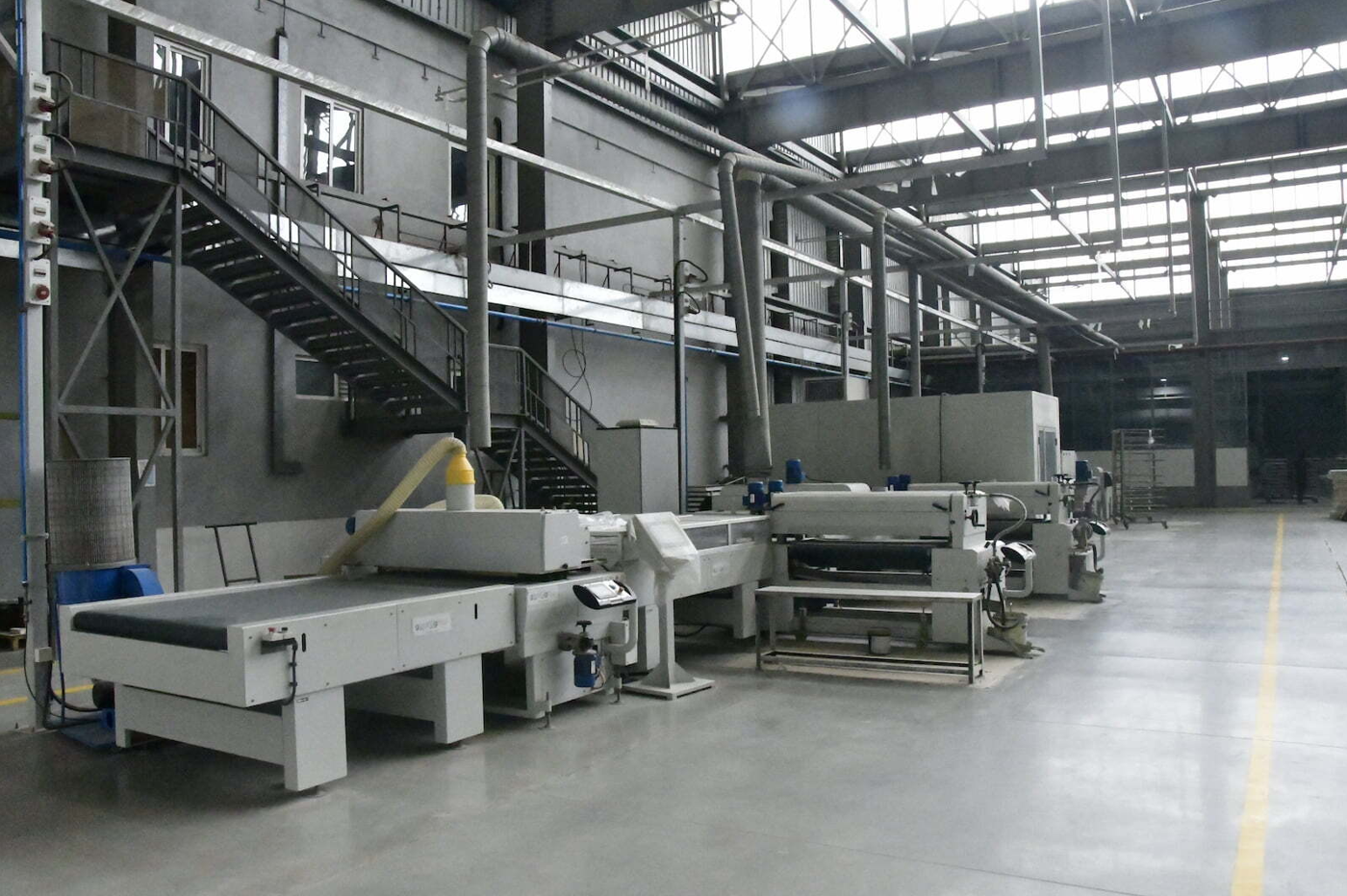 Ground View of Giardina's factory with wood finishing and coating machines